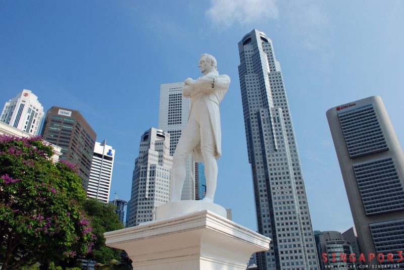 White Statue of Raffles with Singapore city backdrop